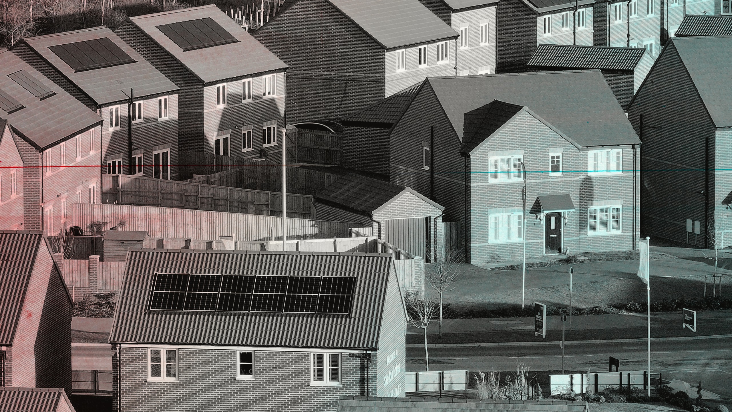 Image of new build houses with solar panels on
